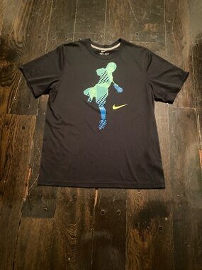 Nike Black Tee with Blue-Green Soccer Silhouette and Yellow Swoosh